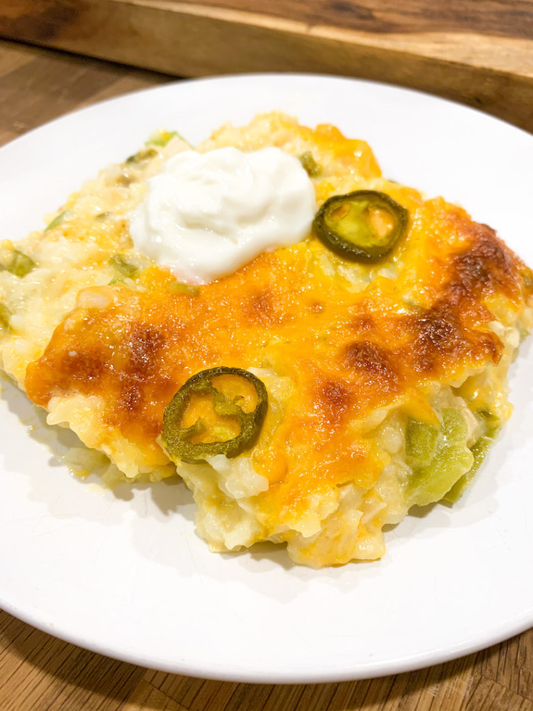 Top your serving of jalapeno popper casserole with a dollop of sour cream