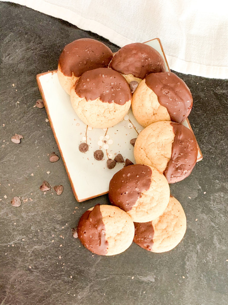 Almond butter cookies swathed in chocolate with a sprinkle of sea salt.