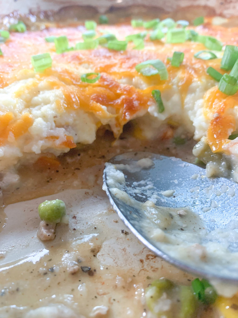 Close up of the inside of turkey shepherd's pie with mashed cauliflower