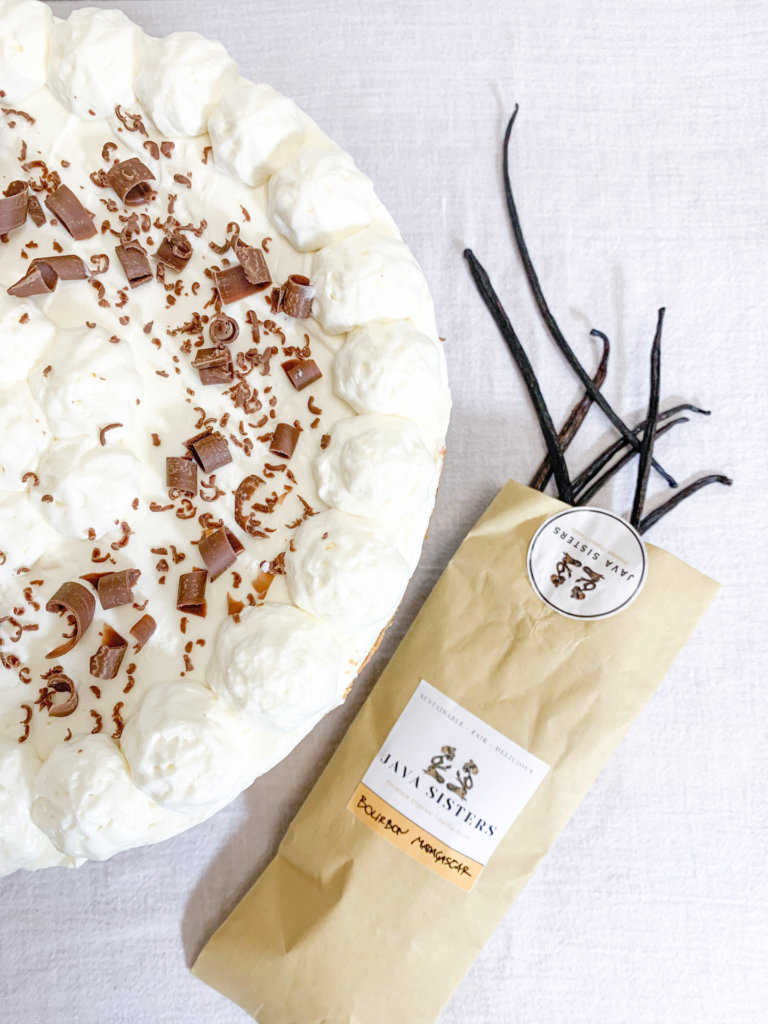 Java Sisters Bourbon Vanilla Packaging next to vanilla bean cheesecake