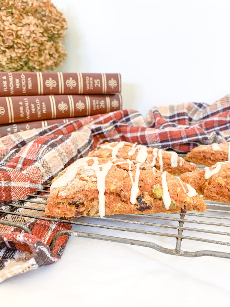 Pumpkin Scones with maple drizzle on a cooling rack