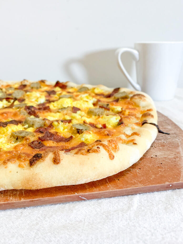 Golden bubbly cheese on the crust of your breakfast pizza