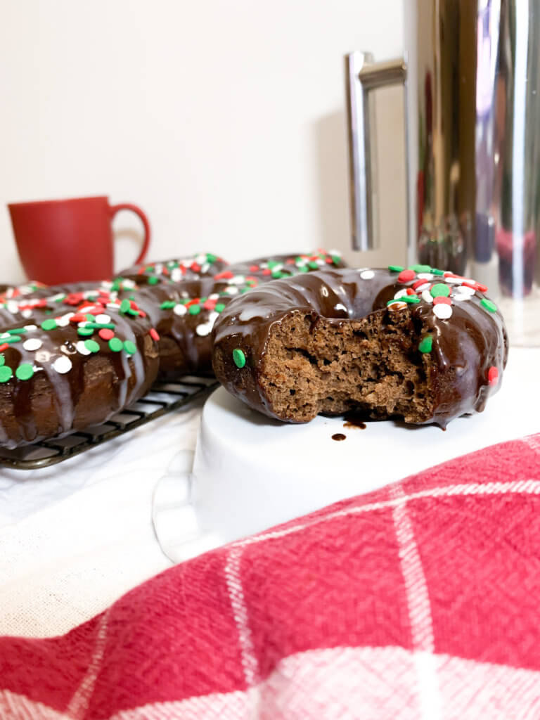 peppermint mocha donut with a bite taken out of it