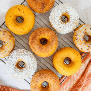 baked pumpkin spice donuts with 4 different topping options