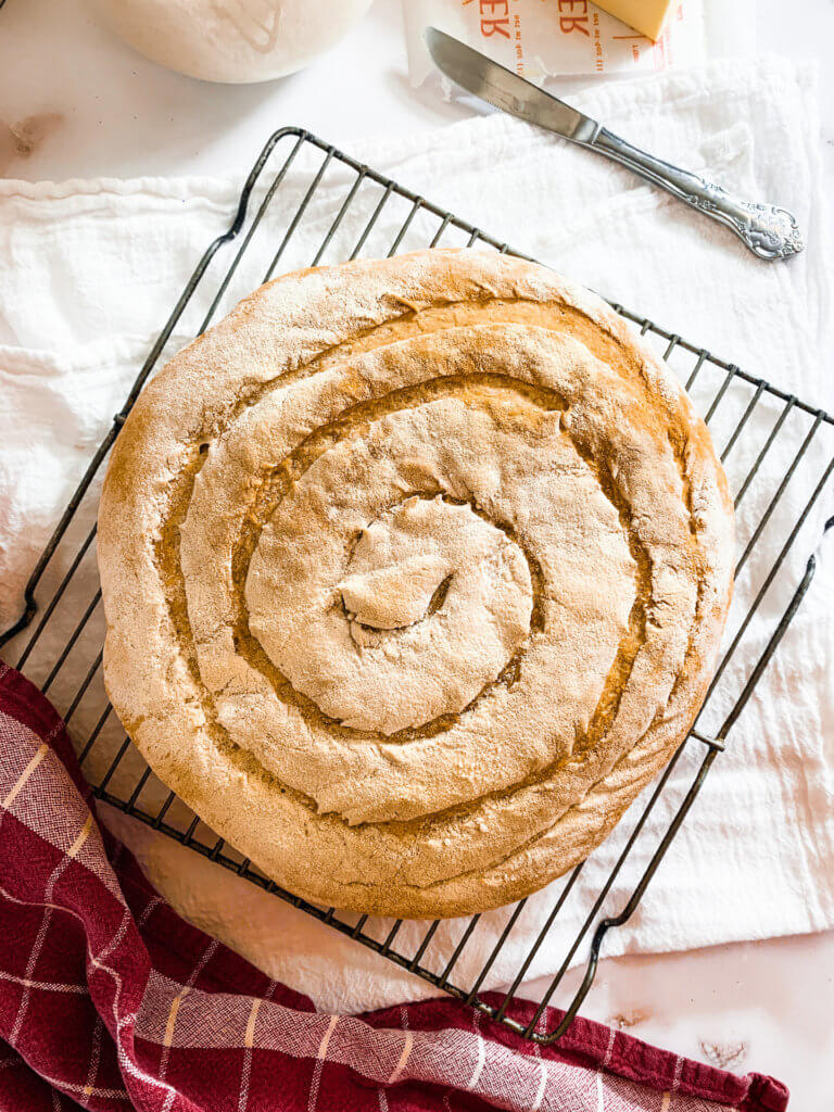 Lazy sourdough bread with a spiral score design