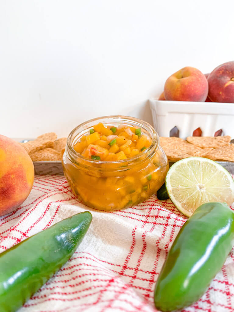 spicy peach salsa with fresh jalapeños and peaches