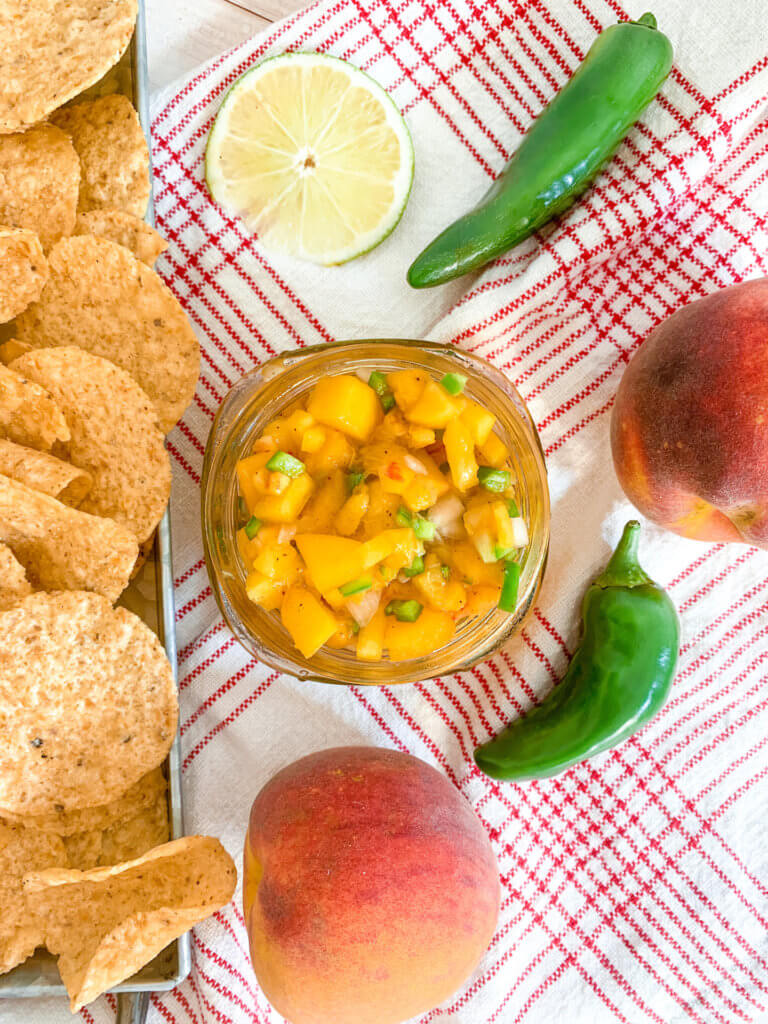 spicy peach salsa with peaches and jalapeños