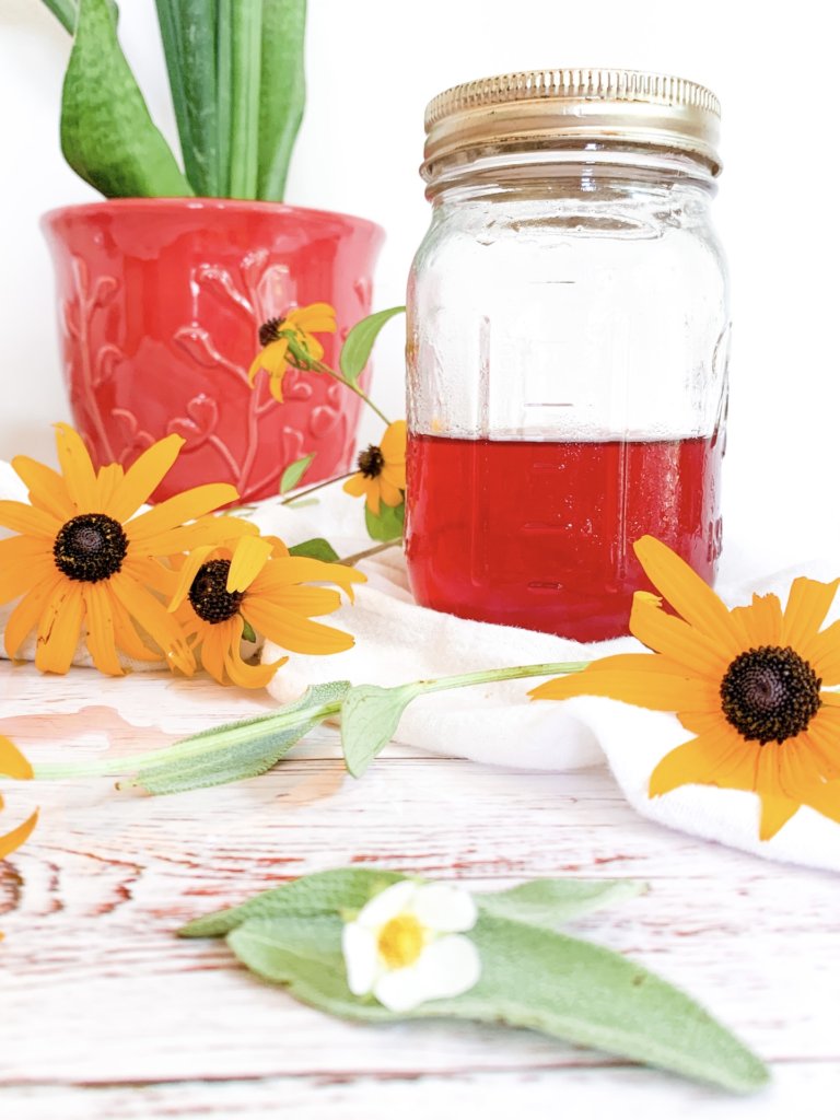 Strawberry sage syrup with black eyed susans